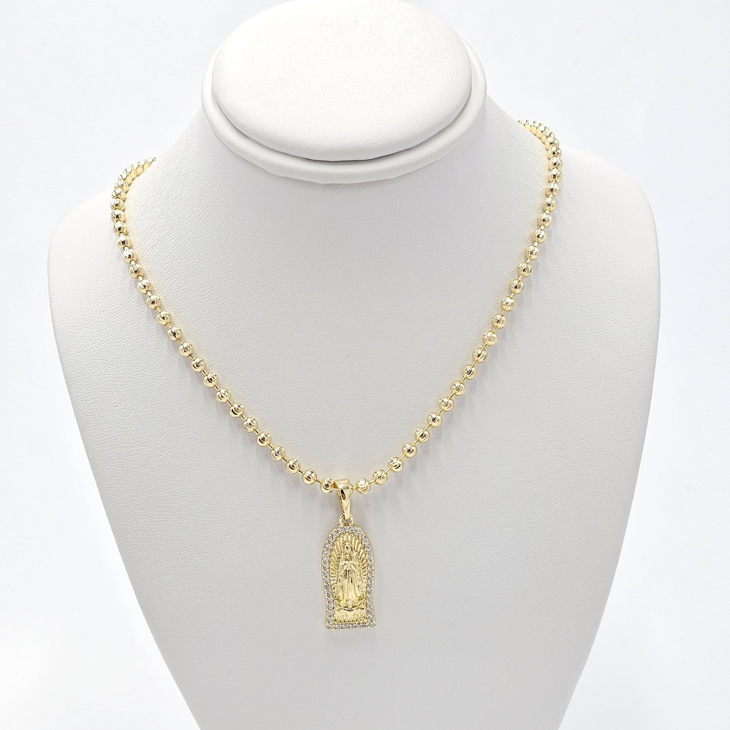 Virgin pendant and ball chain. size 18 inches