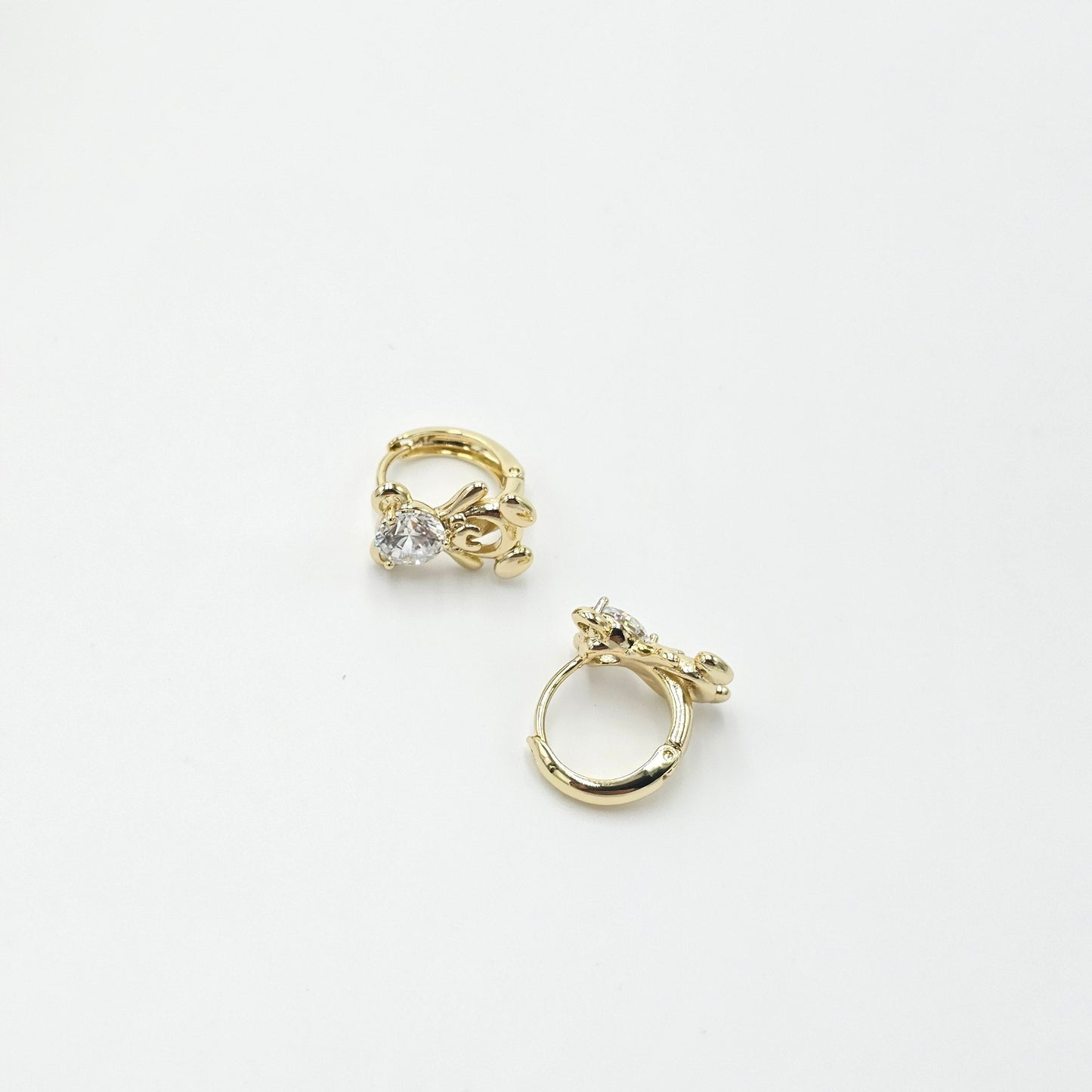 clear bear earring. size small