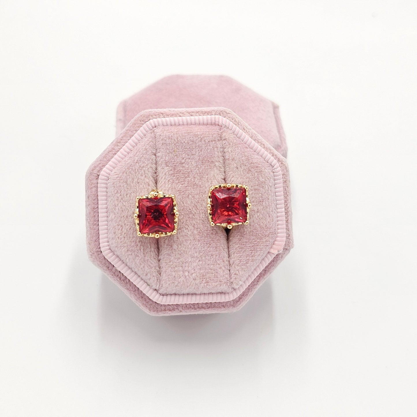 small red earrings. size small
