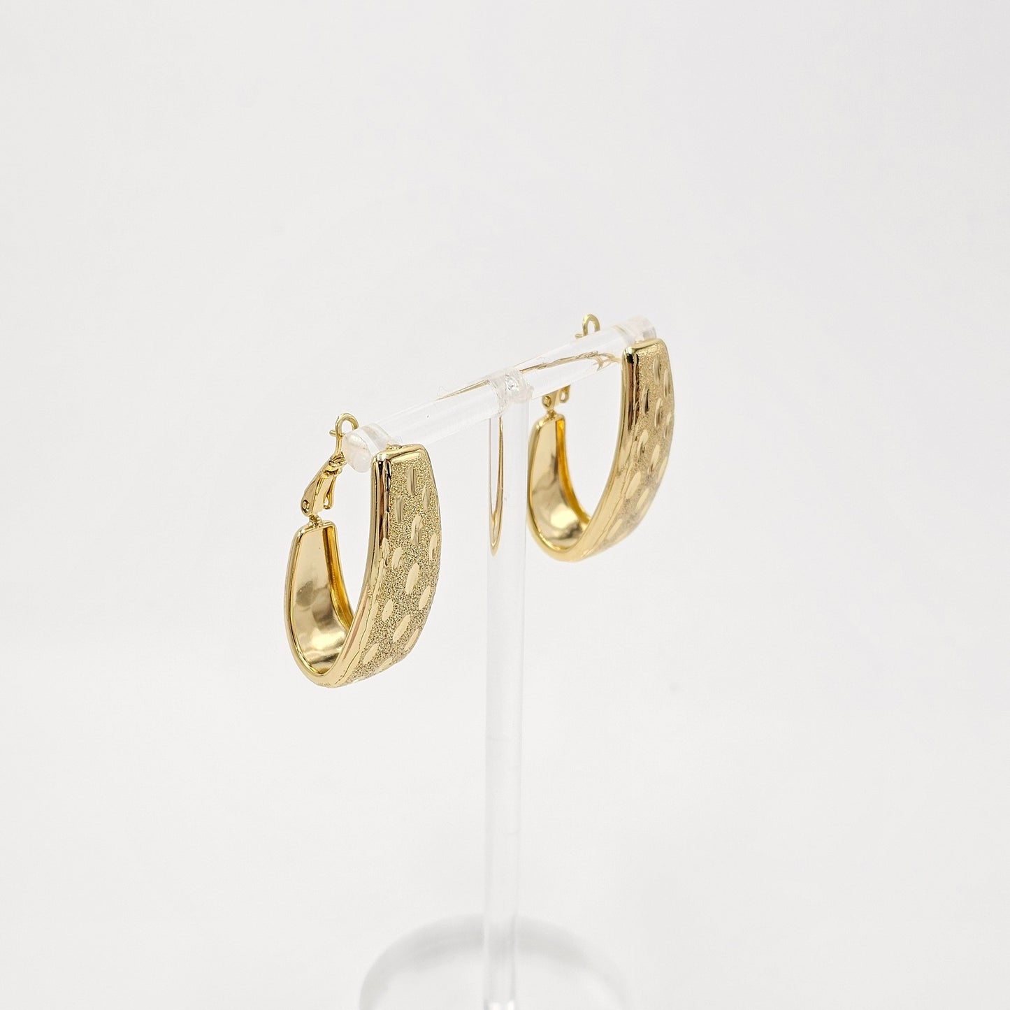 golden hoops earrings.