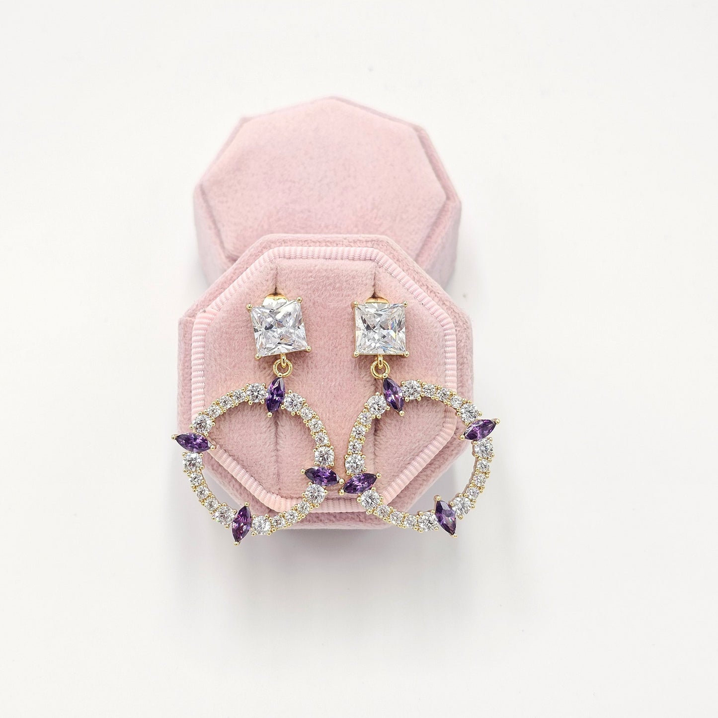 crystal purple and clear earrings.