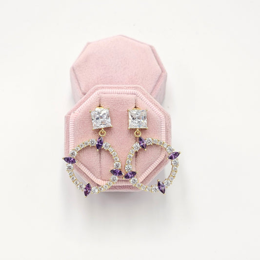 crystal purple and clear earrings.