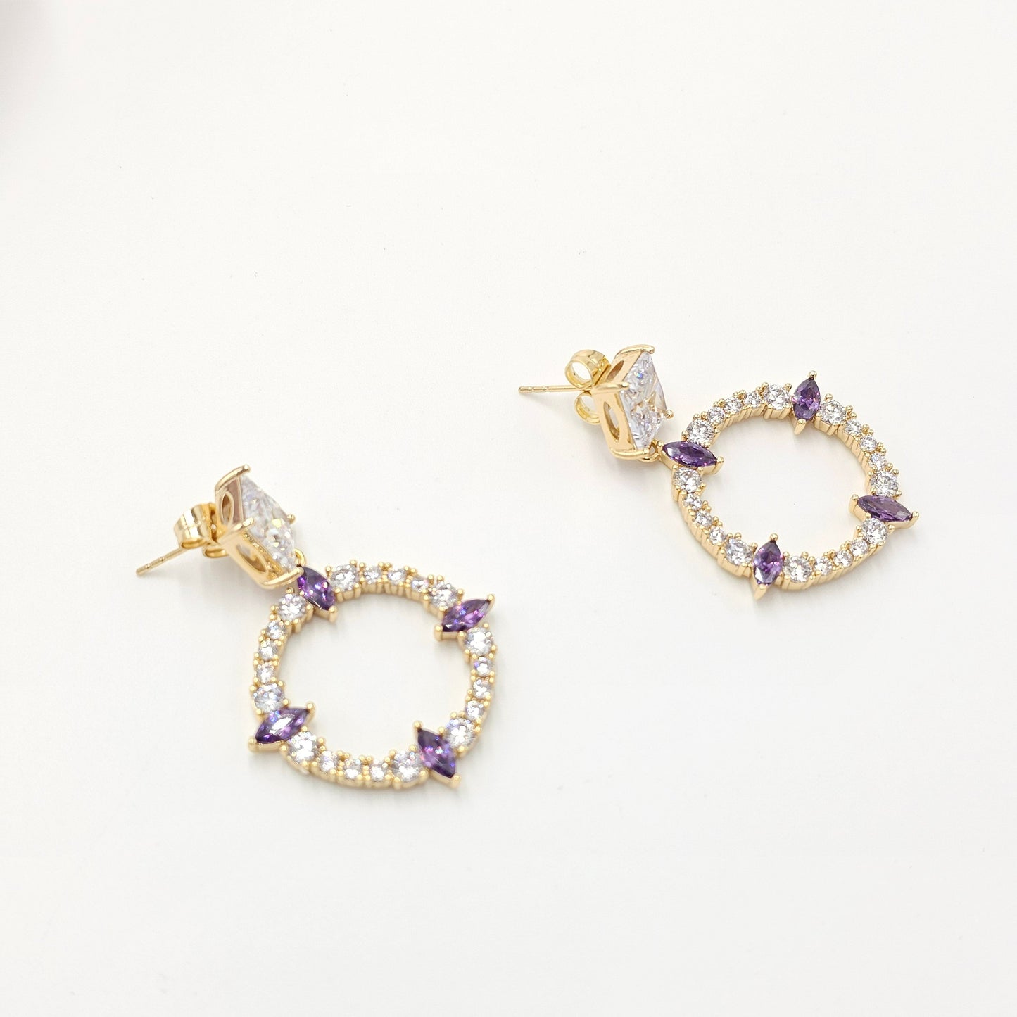 crystal purple and clear earrings.