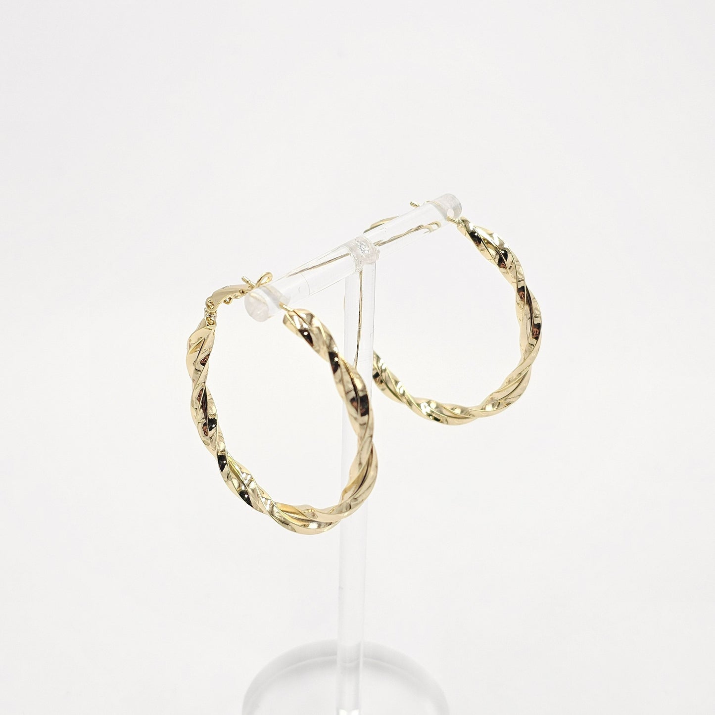 golden hoops earrings. size medium
