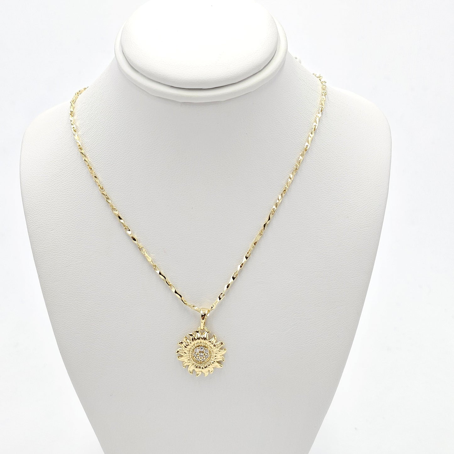 Sun pendant and chain. size 18 inches